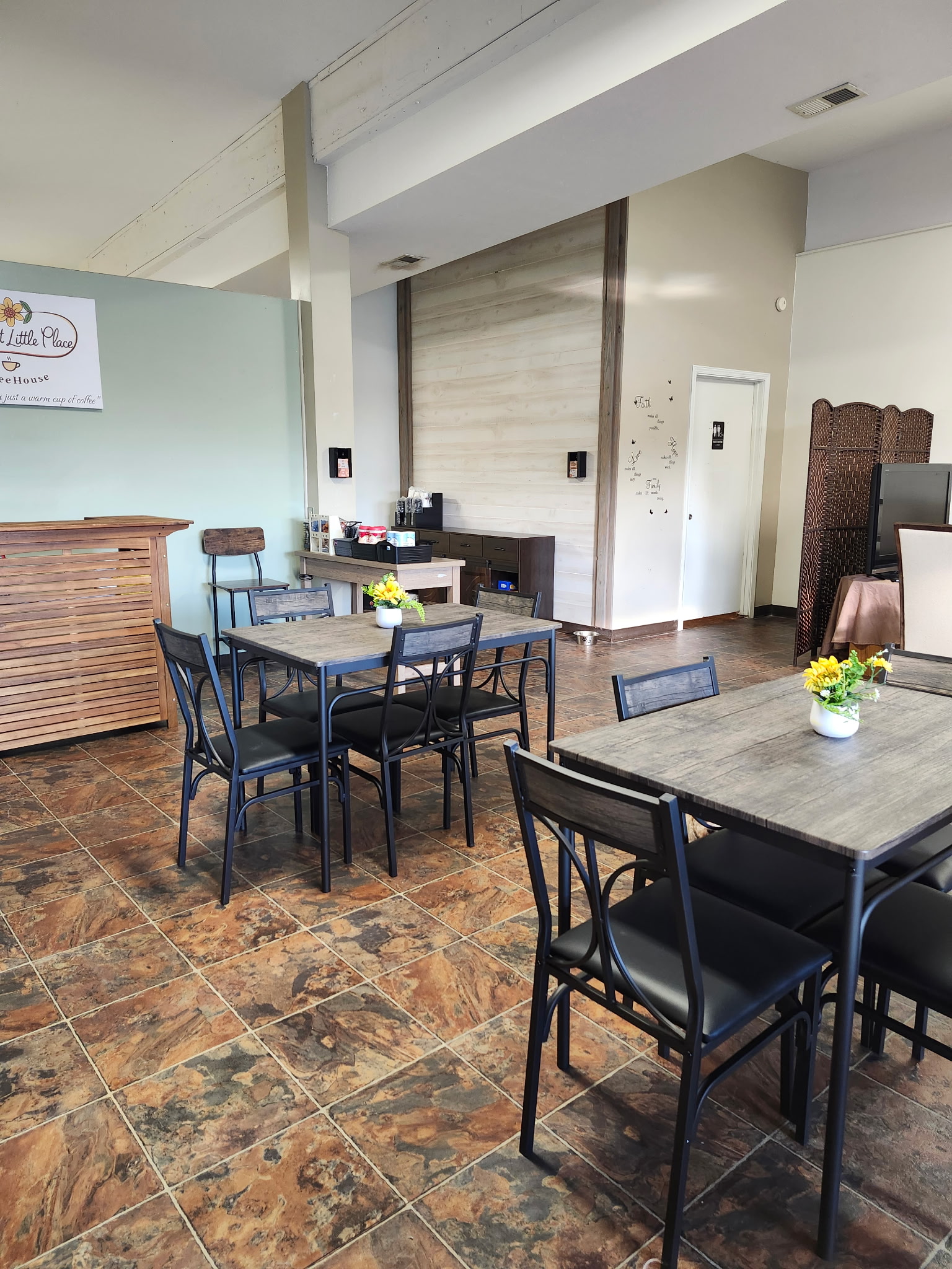 Sunflower-decorated seating inside the coffeehouse