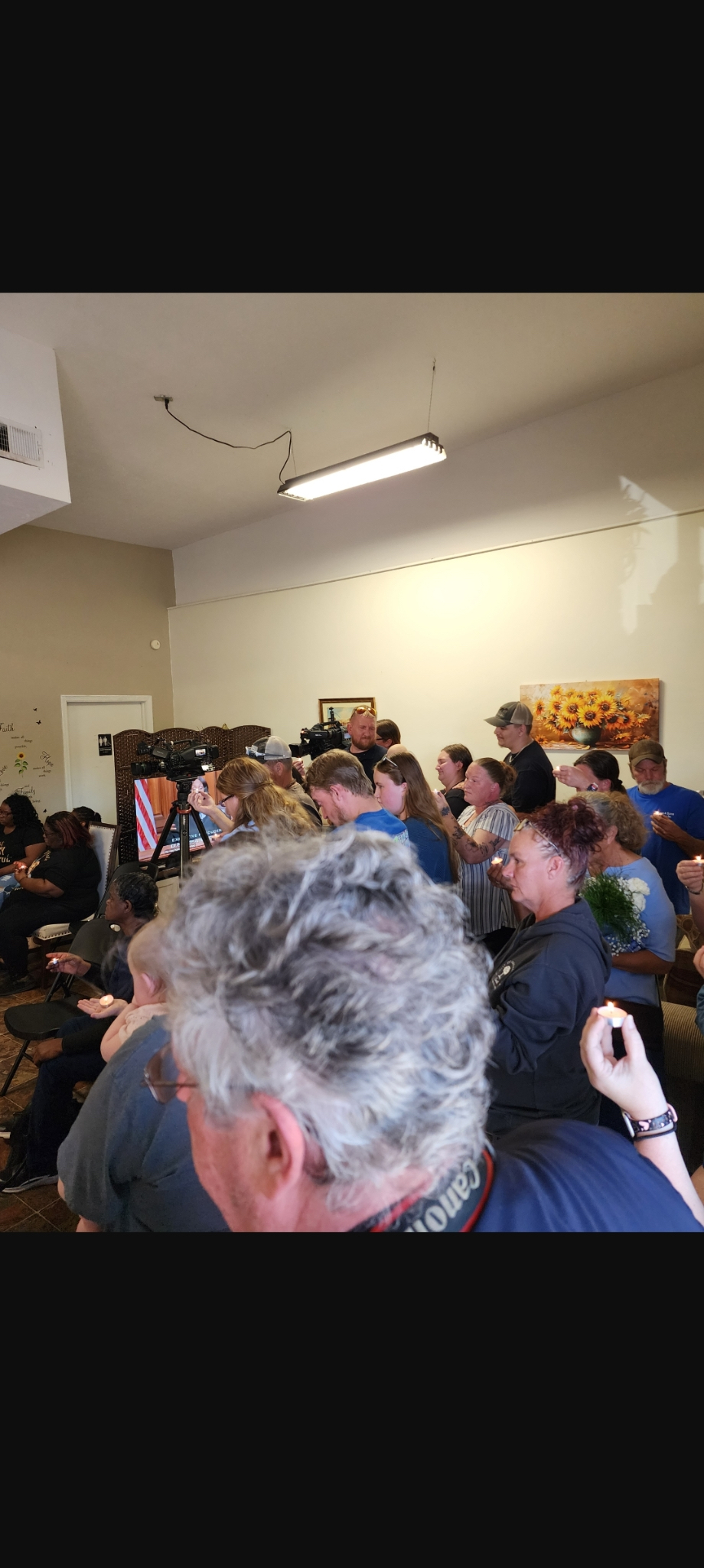 Community members gathered for a candlelight service